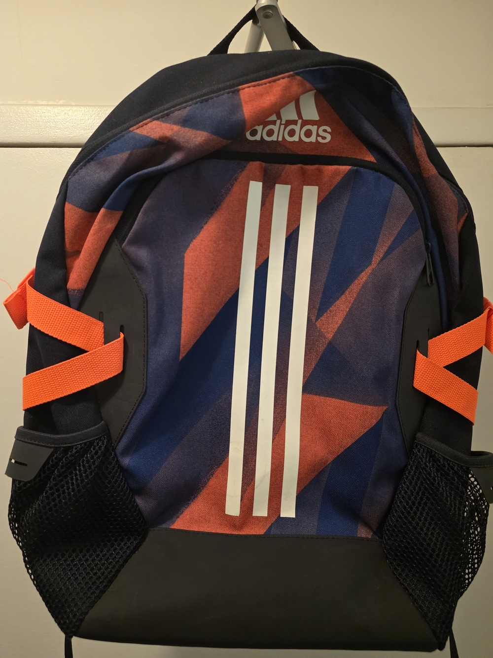 Adidas Power V G Backpack in a Multicolor Geometric Design.